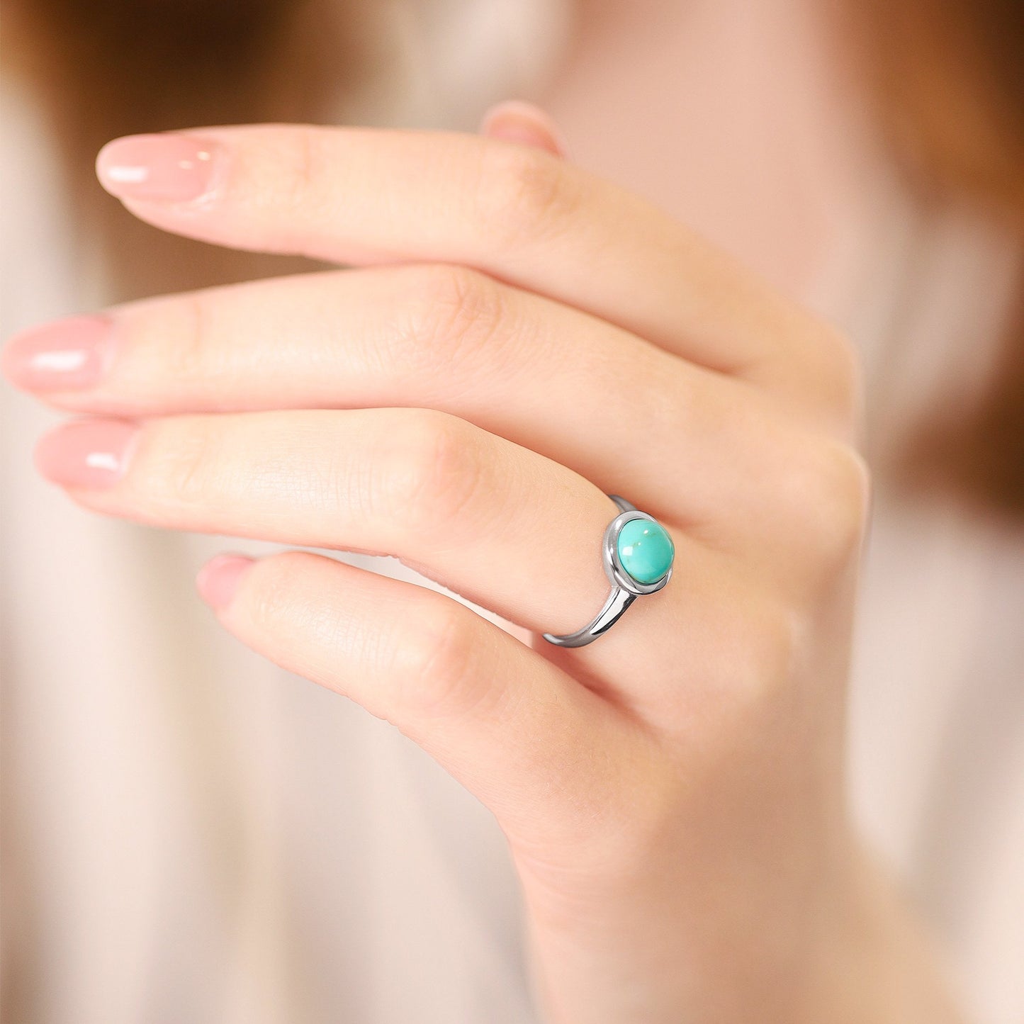 Silver rhodium plated ring with rec turquoise stone